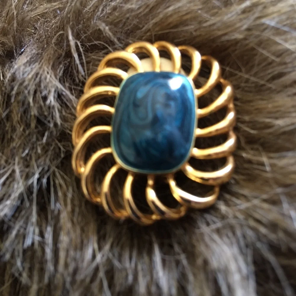 Vintage gold tone swirl blue enamel clip earrings